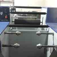 دستگاه رول جمع کن سفره و فویل